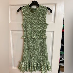 Likely green ruffle dress
